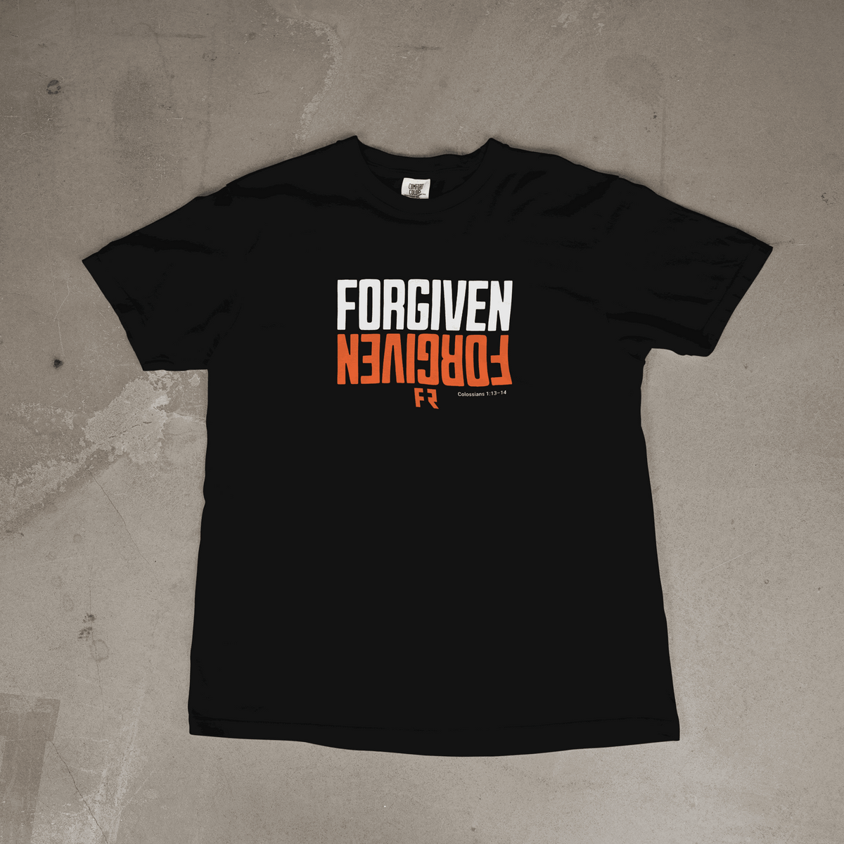 Black Forgiven Tee with clean typography and soft cotton blend fabric