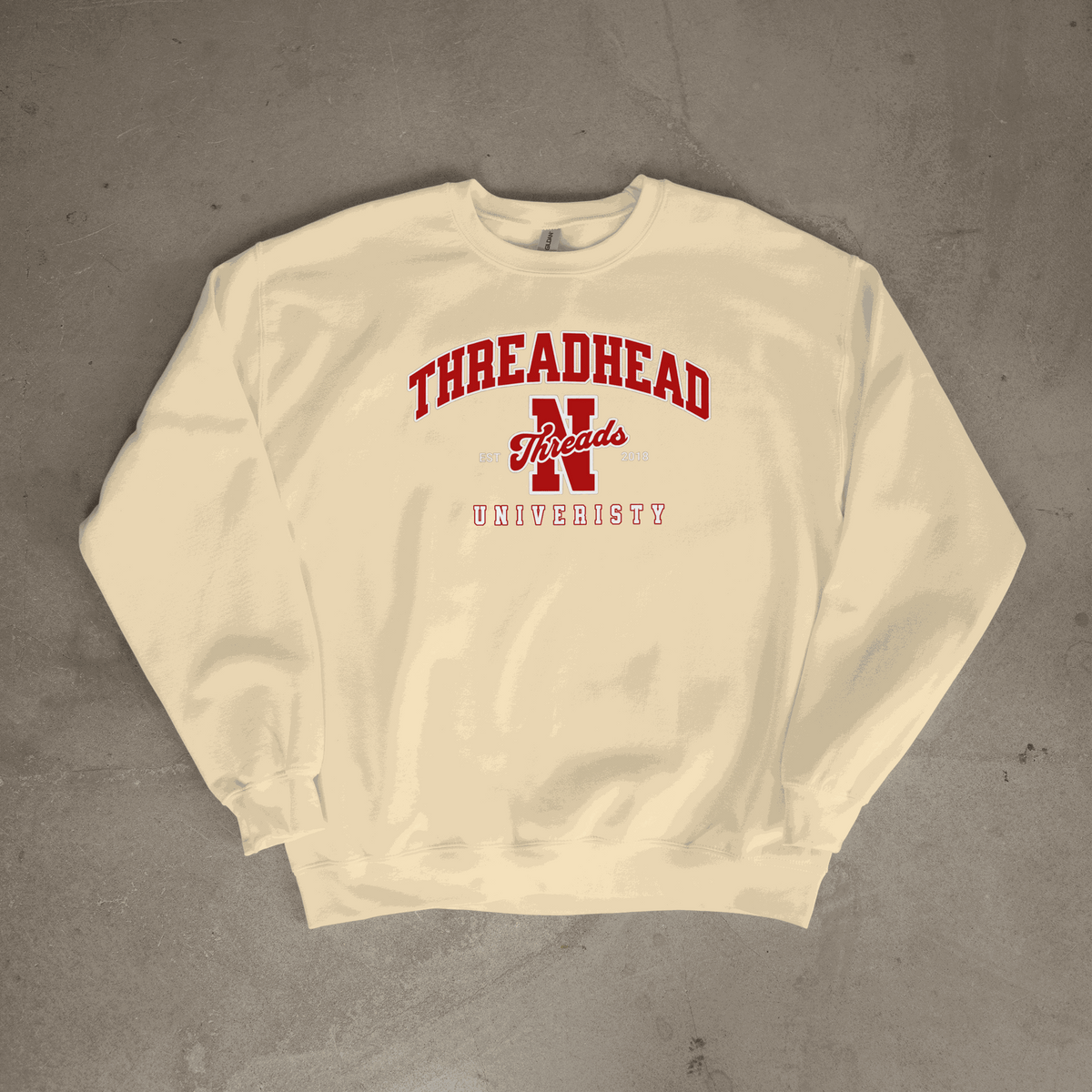 ThreadHead University Sweatshirt with varsity-style "EST. 2024" graphic and collegiate design