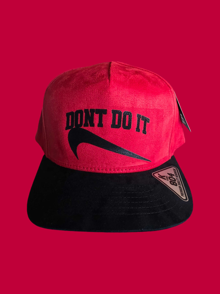 Red and black cap with 'DON'T DO IT' text on a red background