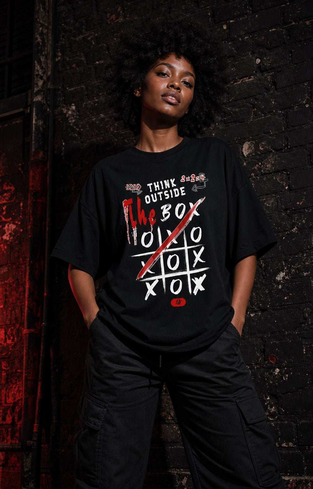 Black woman wearing the Think Outside the Box graphic tee